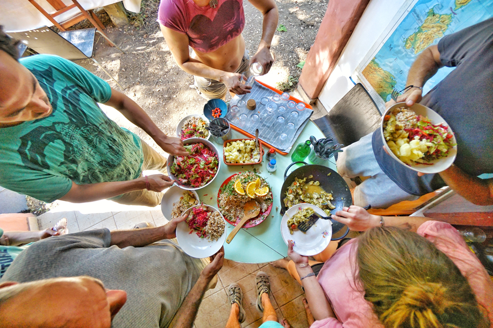 Sharing a meal together around the table at Mosaic