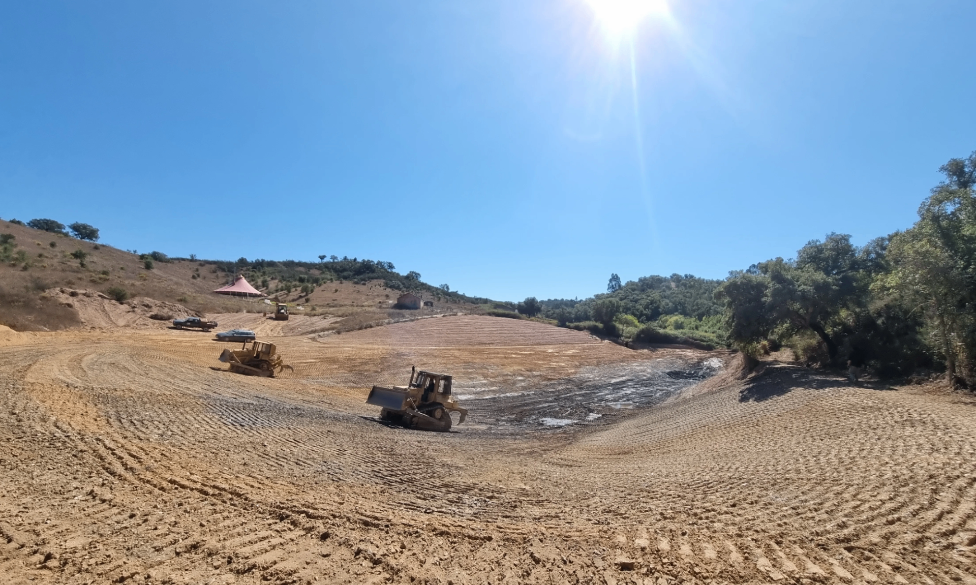 The basin takes form, contoured, sealed, waiting.